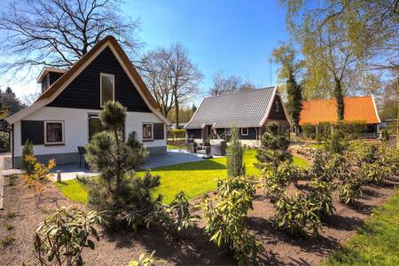 Vrijstaande vakantiehuizen met grote tuinen op vakantiepark EuroParcs De Hooge Veluwe