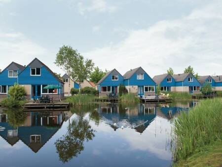 Vakantiehuizen aan het water met steigers op vakantiepark Landal Domein de Schatberg