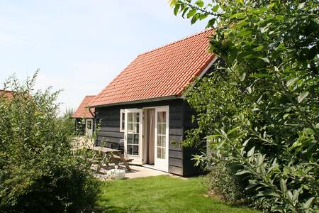 Vakantiehuis in de echte Zeeuwse stijl op vakantiepark Oosterscheldepark De Stelhoeve