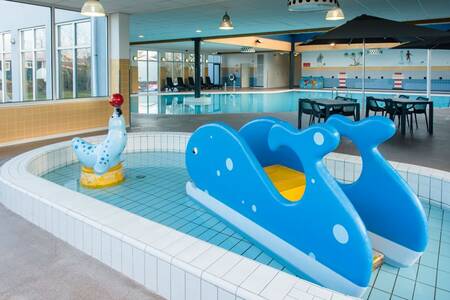Het peuterbad met glijbaan van Roompot Vakantiepark Boomhiemke